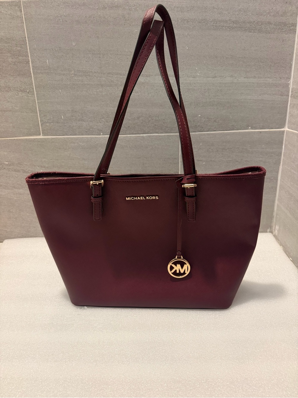 Michael Kors Wine Red Leather Tote with Gold MK Charm